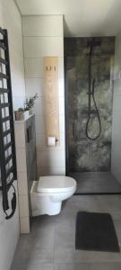 Koupelna v ubytování Domek Ponad Mgłami + 26 fotografií