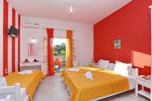 A bed or beds in a room at Evaggelia Studios