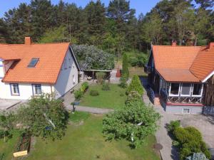 an aerial view of a house with an orange roof at Mariu Krantas in Nida