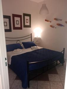 Llit o llits en una habitació de Matteo's House Taormina