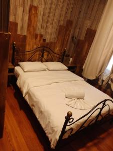 Posteľ alebo postele v izbe v ubytovaní 1920s Rooms