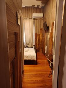 Posteľ alebo postele v izbe v ubytovaní 1920s Rooms