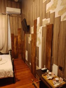 Posteľ alebo postele v izbe v ubytovaní 1920s Rooms