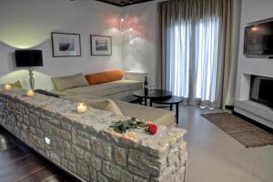 Televízia a/alebo spoločenská miestnosť v ubytovaní Guesthouse Diochri