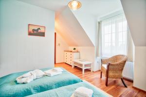Cama o camas de una habitación en Hotel U Pekaře - Jítravský Dvorec