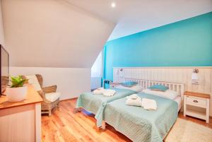 Cama o camas de una habitación en Hotel U Pekaře - Jítravský Dvorec