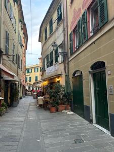 an empty street in a city with buildings at [Centro-Storico] Tutto a 2 passi in Rapallo