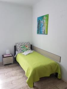 Łóżko lub łóżka w pokoju w obiekcie Apartament Angelo