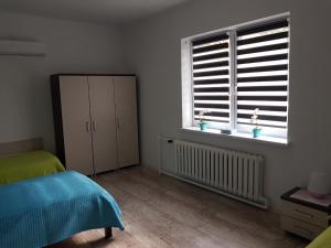 Łóżko lub łóżka w pokoju w obiekcie Apartament Angelo