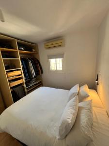 Posteľ alebo postele v izbe v ubytovaní Apartamento R