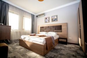 Postel nebo postele na pokoji v ubytování Hotel Yarus
