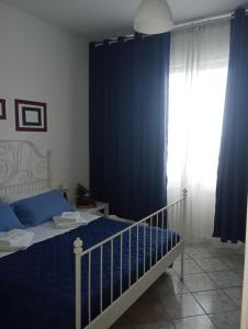 Llit o llits en una habitació de Matteo's House Taormina