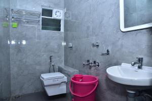 Koupelna v ubytování SHREE BALAJI PALACE Homestay
