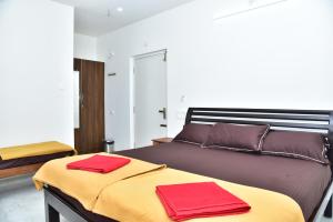 Postel nebo postele na pokoji v ubytování SHREE BALAJI PALACE Homestay
