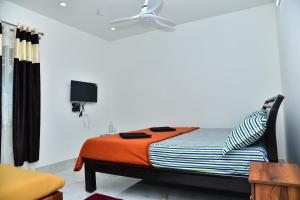 Postel nebo postele na pokoji v ubytování SHREE BALAJI PALACE Homestay