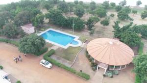 an overhead view of a pool in a park at Centre Ecotouristique de Bagré in Saré