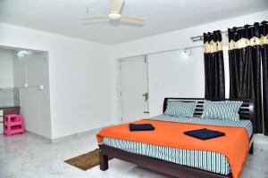Postel nebo postele na pokoji v ubytování SHREE BALAJI PALACE Homestay