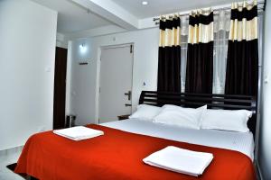 Postel nebo postele na pokoji v ubytování SHREE BALAJI PALACE Homestay