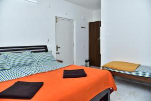 Postel nebo postele na pokoji v ubytování SHREE BALAJI PALACE Homestay