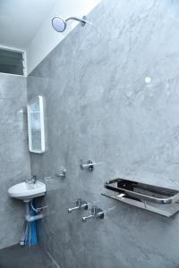 Koupelna v ubytování SHREE BALAJI PALACE Homestay