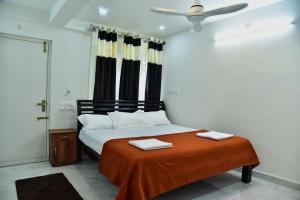 Postel nebo postele na pokoji v ubytování SHREE BALAJI PALACE Homestay