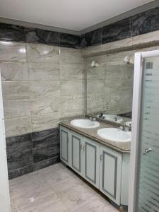 A bathroom at comforting apartment with privacy