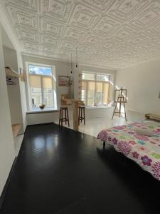 Postel nebo postele na pokoji v ubytování Andreevskiy mini-hotel