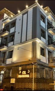a building with a sign in front of it at CK PALACE Hotel in Istanbul +39 photos