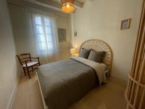 En eller flere senge i et værelse på Résidence Léonard - Centre historique Arles
