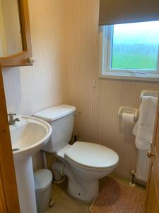 Vannituba majutusasutuses Farm stay caravan on working farm
