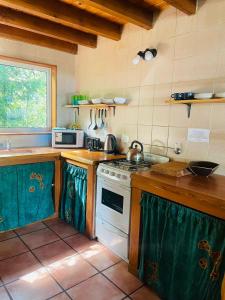 A cozinha ou cozinha compacta de Casa Verdecita