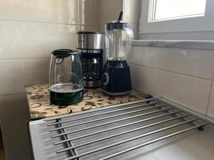 a counter with two blenders on top of it at Apartment Vitezic in Punat