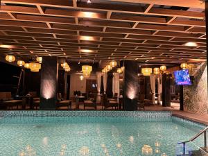 Bazén v ubytování Hotel Ami Grace nebo v jeho okolí