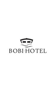 a logo for a hotel at Bobi Hotel in Shkodër