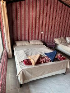 Postel nebo postele na pokoji v ubytování Jordan Rum Camp