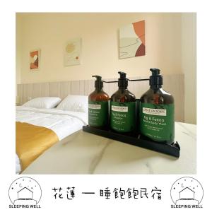 Postel nebo postele na pokoji v ubytování 睡飽飽民宿 Sleeping Well B&B 全新電梯民宿