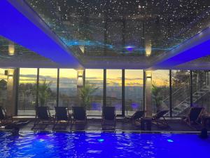 Bazén v ubytování Milmari Resort - Apartman L43 nebo v jeho okolí