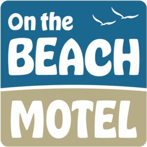 ein Schild am Strand mcolmmber in der Unterkunft On the Beach Motel in Old Orchard Beach