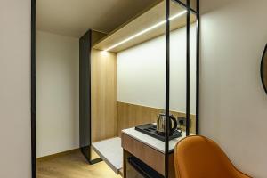 Kuchyň nebo kuchyňský kout v ubytování Hotel Eden Serenity