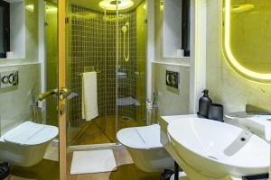 Koupelna v ubytování Hotel Eden Serenity