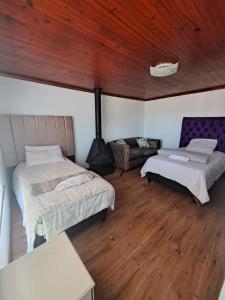 Ένα ή περισσότερα κρεβάτια σε δωμάτιο στο Station Home