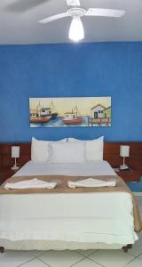 Postel nebo postele na pokoji v ubytování Pousada Villa Del Mare