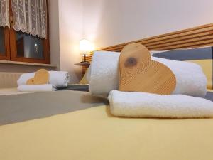 Postel nebo postele na pokoji v ubytování ElvesHome - Alpine Stay Apartments