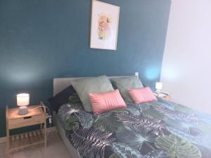 Posteľ alebo postele v izbe v ubytovaní Le Barcares bel appartement 62m2 -2 chambres + 17 fotografií