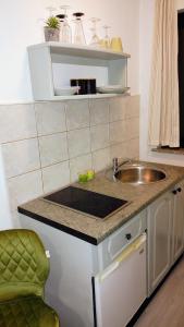 Dapur atau dapur kecil di Apartment Acacia