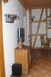 TV a/nebo společenská místnost v ubytování Pension Reuss - Hotel garni