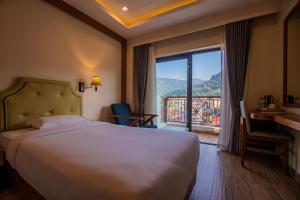 Tempat tidur dalam kamar di Hotel Fewa Trip