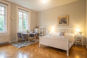 Postel nebo postele na pokoji v ubytování Vila Na Landeku