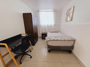 En eller flere senger på et rom på Alojamiento Privado 403 en Antofa