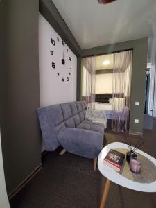 Posezení v ubytování CosHOME - apartament